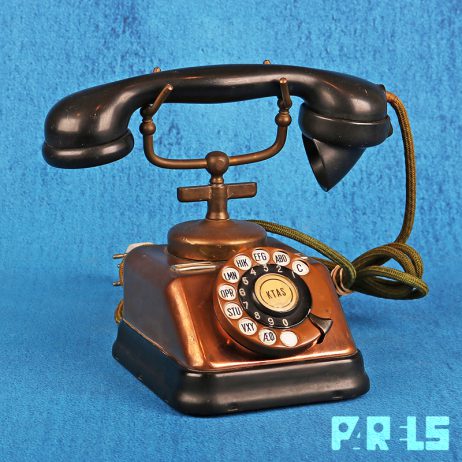 vintage koperen telefoon hoorn bakeliet draaischijf bellen