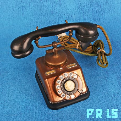 vintage koperen telefoon hoorn bakeliet draaischijf bellen