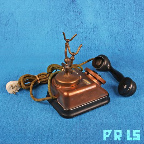 vintage koperen telefoon hoorn bakeliet draaischijf bellen