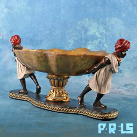 blackamoor schaal vintage decoratie kunstobject centerpiece koloniale stijl oriëntaals klassiek interieur ornament goudkleurig Afrikaans Moors Moren fruitschaal